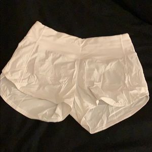 SIZE 4 WHITE LULULEMON SHORTS 4”